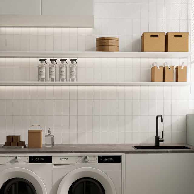 Glossy pure white rectangle peel and stick backsplash tile used as a clean wall backsplash in a laundry room
