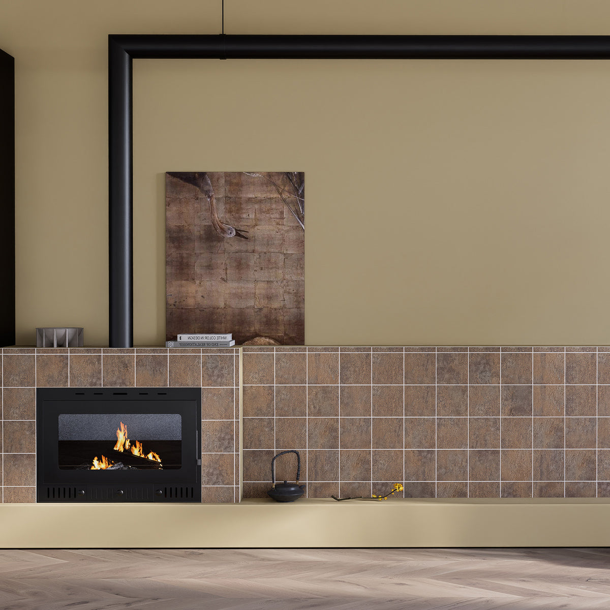 Matte Magma Stone square peel and stick backsplash tiles used on a warm fireplace accent wall
