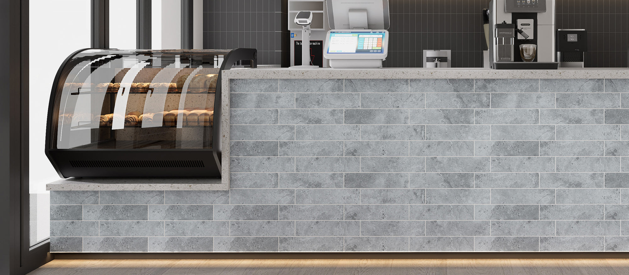Matte Urban Concrete subway peel and stick backsplash tiles installed on a modern bakery counter wall after installation