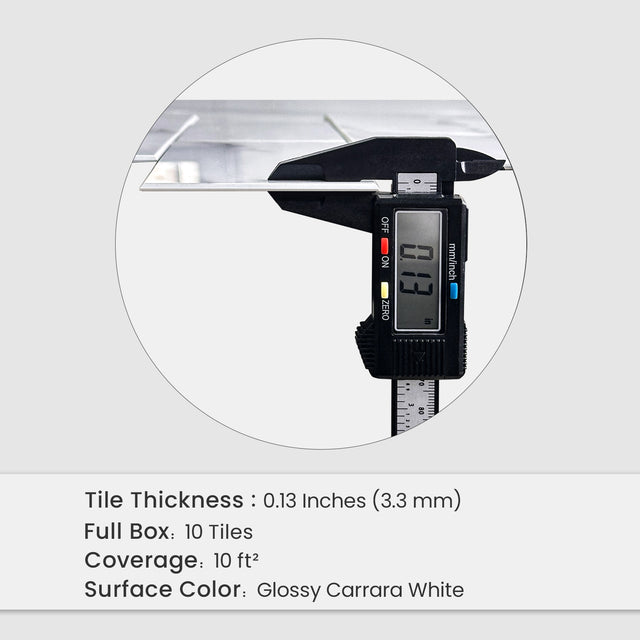 Digital caliper measuring thin Carrara white peel and stick backsplash tile
