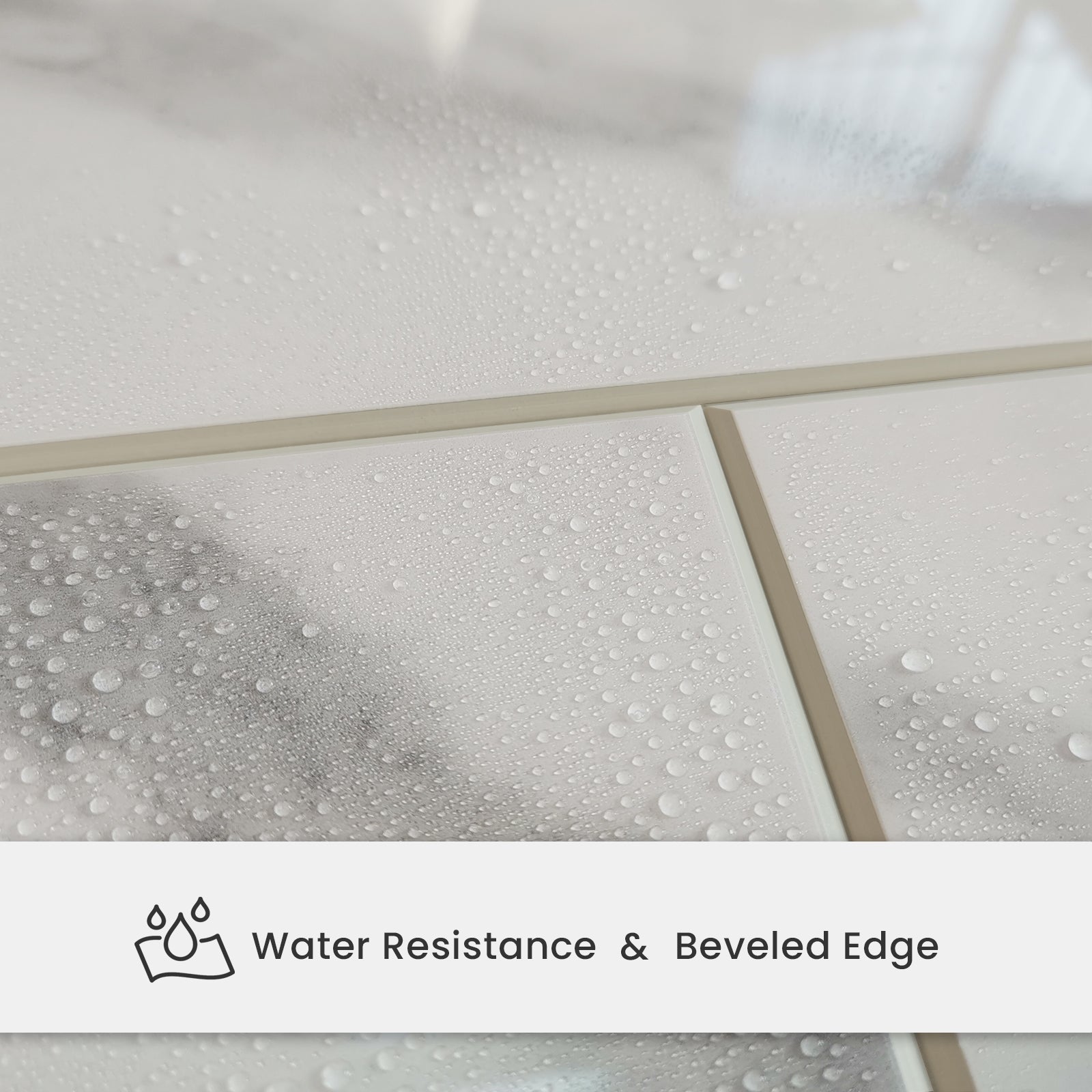 Water droplets on Carrara white peel and stick tile showing beveled edges