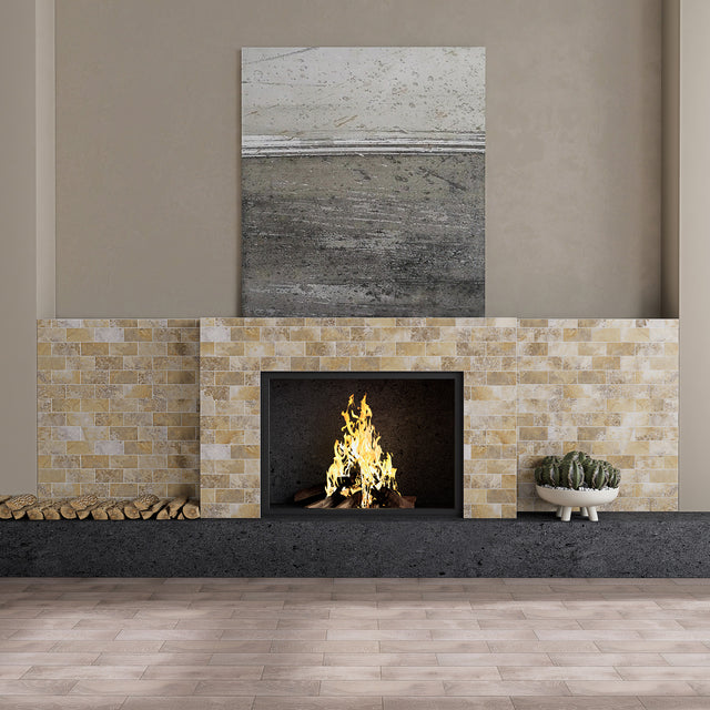 Matte Gobi Sandstone subway peel and stick tiles used on a living room fireplace surround wall