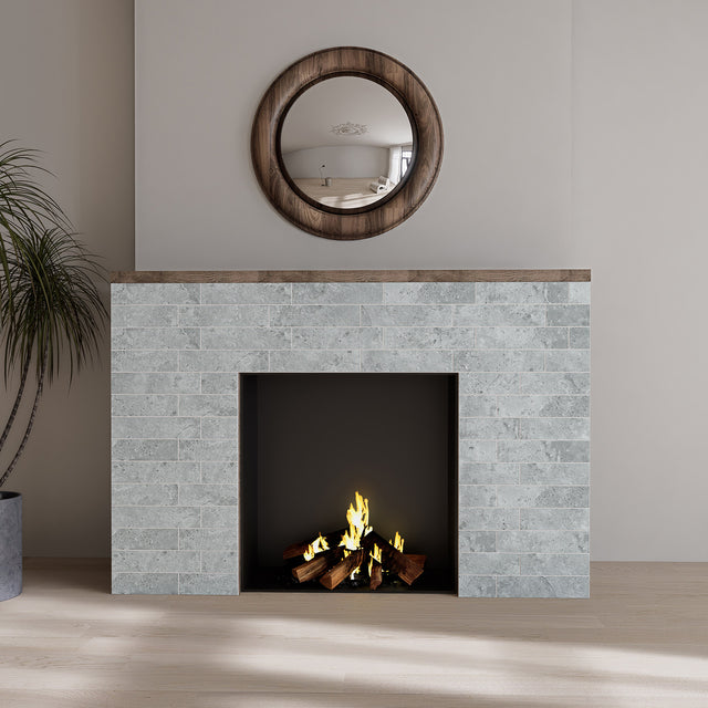 Matte Urban Concrete subway peel and stick tiles used on a contemporary fireplace surround